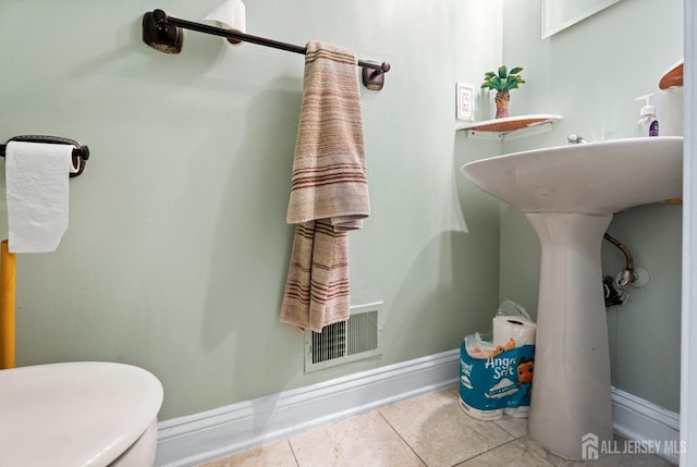 54 Magellan Way, Franklin Twsp, NJ 08823 - bathroom with tile patterned flooring, baseboards, and toilet