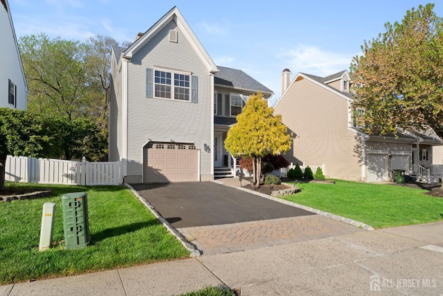 54 Magellan Way, Franklin Twsp, NJ 08823 - traditional-style home with asphalt driveway and an attached garage