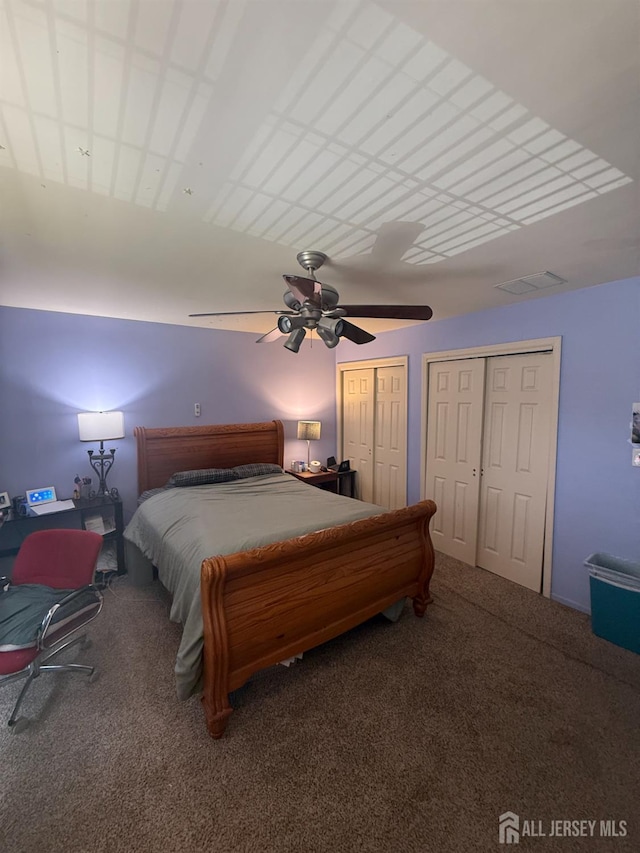 54 Magellan Way, Franklin Twsp, NJ 08823 - carpeted bedroom featuring two closets and a ceiling fan