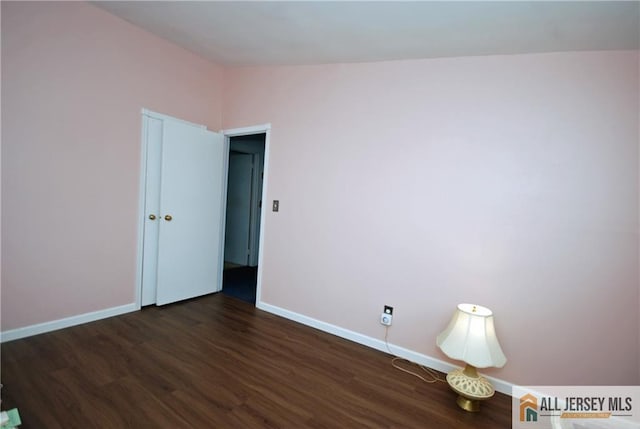 14 Albert Dr, Old Bridge, NJ 08857 - unfurnished room with dark wood-type flooring and baseboards