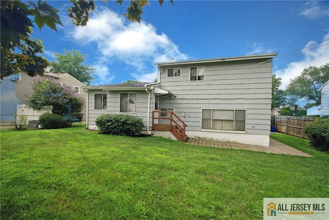 14 Albert Dr, Old Bridge, NJ 08857 - back of house with a patio