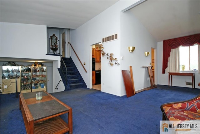 14 Albert Dr, Old Bridge, NJ 08857 - living area featuring carpet, stairs, and high vaulted ceiling