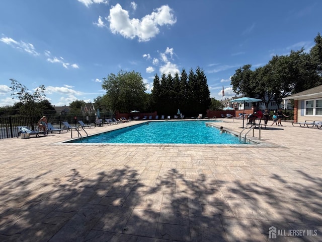 3605 Riddle Ct, Bridgewater, NJ 08807 - community pool with a patio area