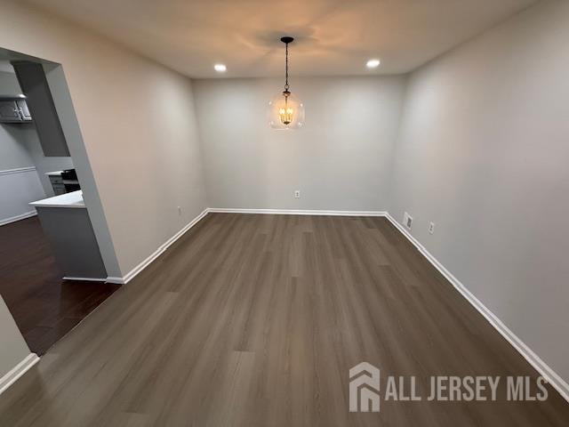 3605 Riddle Ct, Bridgewater, NJ 08807 - unfurnished dining area with dark wood-style flooring and recessed lighting