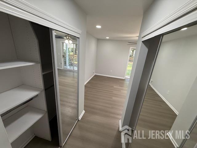 3605 Riddle Ct, Bridgewater, NJ 08807 - corridor featuring dark wood-style floors and recessed lighting