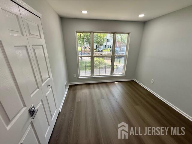3605 Riddle Ct, Bridgewater, NJ 08807 - empty room featuring dark wood finished floors and recessed lighting