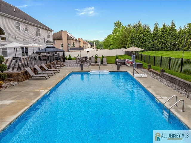 8 Adam Ct, Monroe, NJ 08831 - view of swimming pool featuring a gazebo, a patio area, a fenced backyard, and a residential view