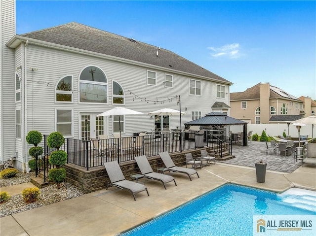 8 Adam Ct, Monroe, NJ 08831 - back of house with a gazebo and a patio