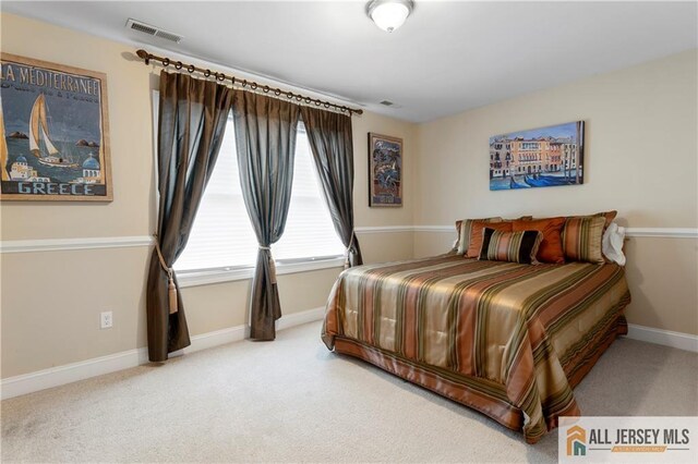 8 Adam Ct, Monroe, NJ 08831 - bedroom featuring light colored carpet and baseboards