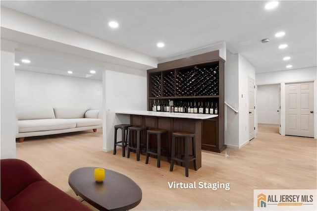 8 Adam Ct, Monroe, NJ 08831 - indoor dry bar with light wood finished floors, recessed lighting, and baseboards