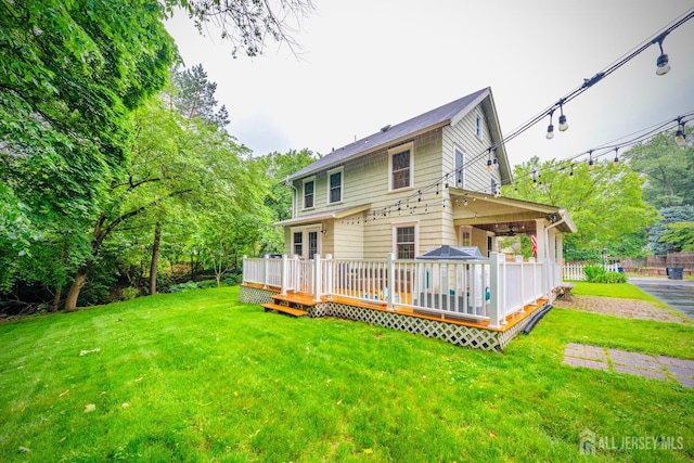 328 John St, Bound Brook, NJ 08805 - back of house with a yard and a deck