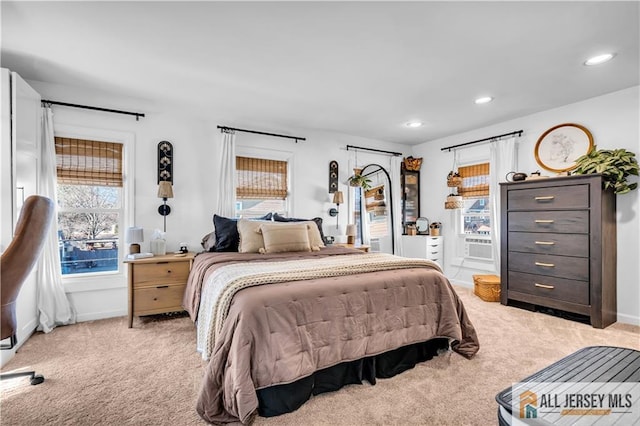 bedroom featuring recessed lighting and light carpet