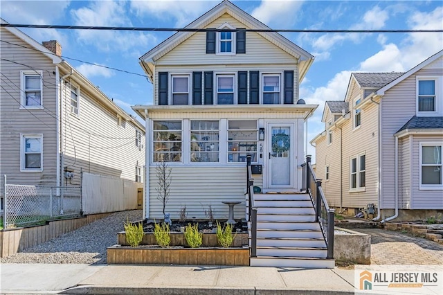 view of front of property with fence