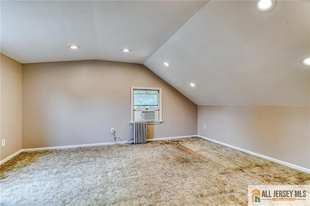 31 Lehigh Ave, Edison, NJ 08837 - additional living space featuring radiator heating unit, carpet flooring, lofted ceiling, and recessed lighting