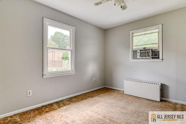 31 Lehigh Ave, Edison, NJ 08837 - carpeted spare room with radiator and baseboards