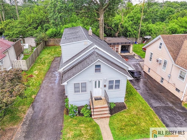31 Lehigh Ave, Edison, NJ 08837 - view of front facade featuring asphalt driveway and roof with shingles