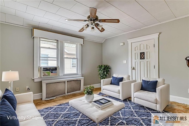 31 Lehigh Ave, Edison, NJ 08837 - living area with a ceiling fan, crown molding, and radiator