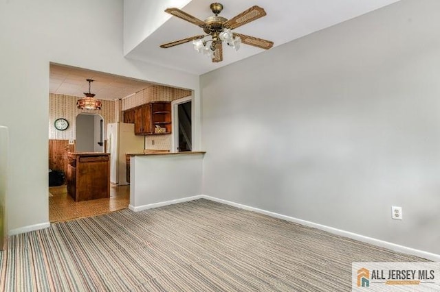 31 Lehigh Ave, Edison, NJ 08837 - unfurnished living room with carpet flooring and a ceiling fan