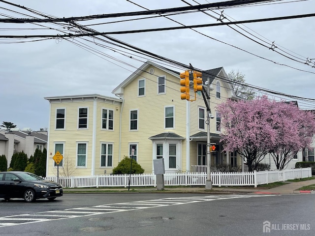 161 George St, New Brunswick, NJ 08901 - view of front of property with a fenced front yard