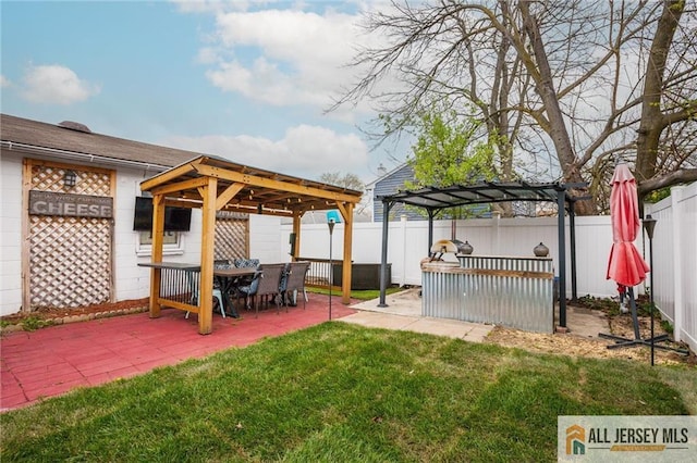 view of yard with a gazebo, a pergola, and a patio area