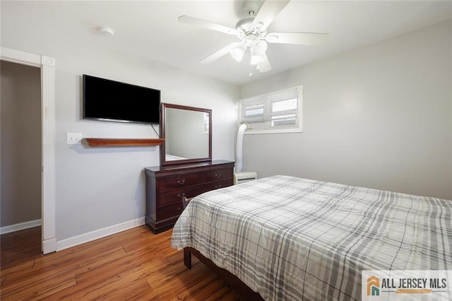 63 W Iselin Pkwy, Iselin, NJ 08830 - bedroom featuring wood finished floors and a ceiling fan