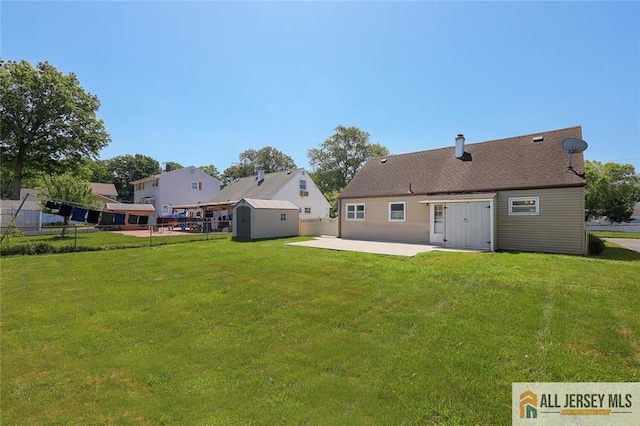 63 W Iselin Pkwy, Iselin, NJ 08830 - back of property featuring a patio, a shed, a fenced backyard, and a chimney