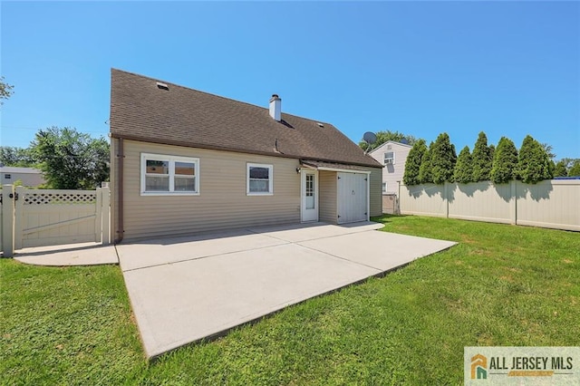 63 W Iselin Pkwy, Iselin, NJ 08830 - back of house featuring a patio area and a chimney