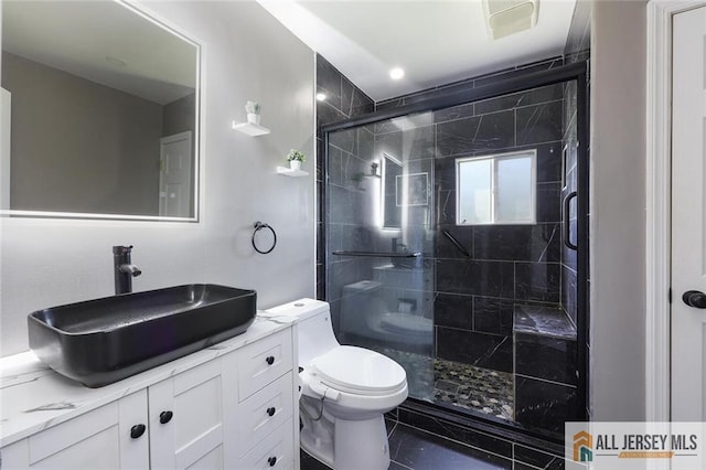 63 W Iselin Pkwy, Iselin, NJ 08830 - bathroom featuring a stall shower, vanity, and tile patterned floors