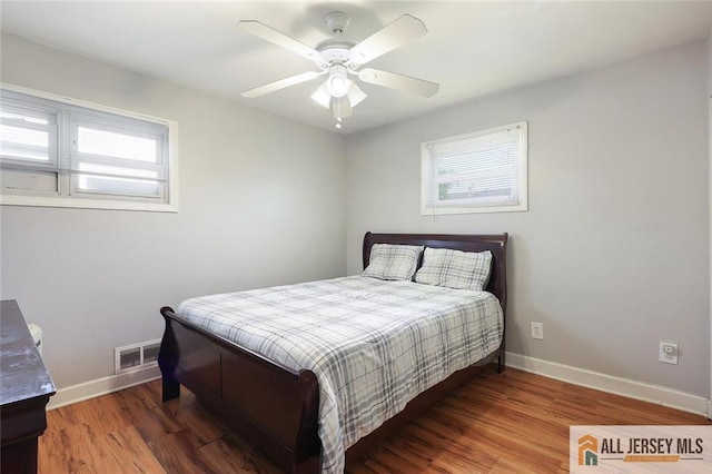 63 W Iselin Pkwy, Iselin, NJ 08830 - bedroom featuring wood finished floors and a ceiling fan
