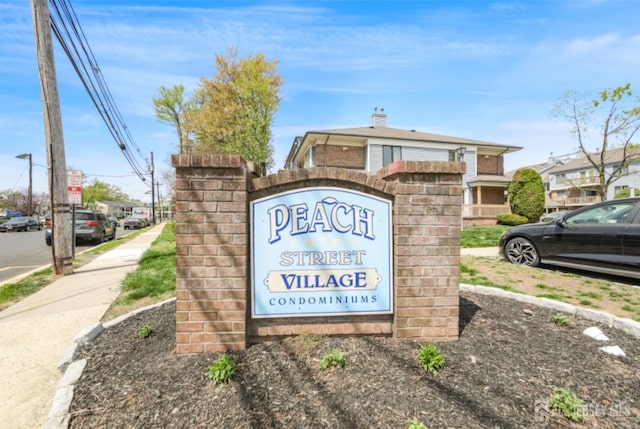 view of community sign