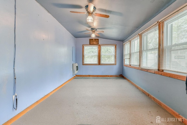 14 Bradford Rd, East Brunswick, NJ 08816 - carpeted empty room featuring vaulted ceiling, ceiling fan, heating unit, and baseboards