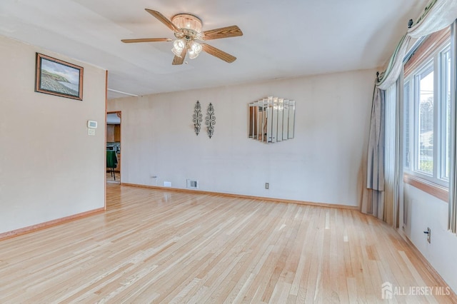 14 Bradford Rd, East Brunswick, NJ 08816 - spare room featuring light wood-style flooring, a ceiling fan, and baseboards