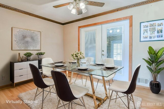 14 Bradford Rd, East Brunswick, NJ 08816 - dining space featuring light wood finished floors, ceiling fan, baseboards, and ornamental molding