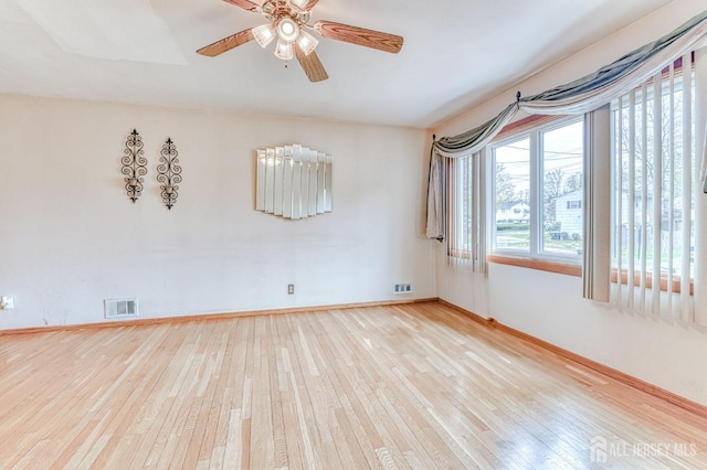 14 Bradford Rd, East Brunswick, NJ 08816 - empty room featuring hardwood / wood-style floors, baseboards, and a ceiling fan