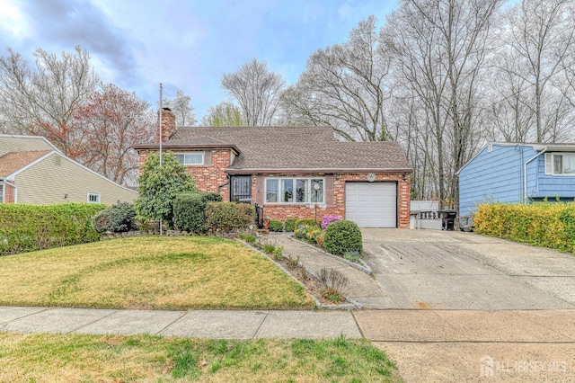 14 Bradford Rd, East Brunswick, NJ 08816 - tri-level home featuring brick siding, driveway, an attached garage, a front lawn, and a chimney