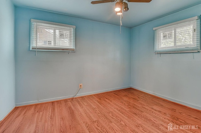 14 Bradford Rd, East Brunswick, NJ 08816 - spare room featuring plenty of natural light, wood finished floors, and a ceiling fan
