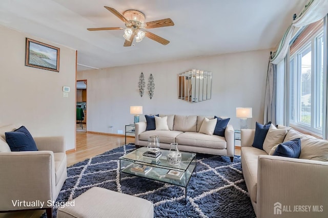 14 Bradford Rd, East Brunswick, NJ 08816 - living room featuring plenty of natural light, wood finished floors, and a ceiling fan
