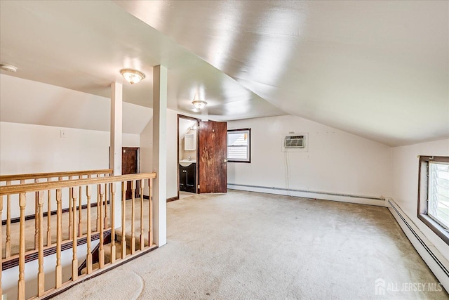 137 Grand Ave, Iselin, NJ 08830 - additional living space with a baseboard heating unit, lofted ceiling, and carpet floors
