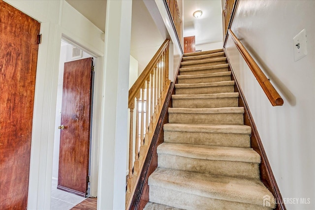 137 Grand Ave, Iselin, NJ 08830 - stairway featuring baseboards
