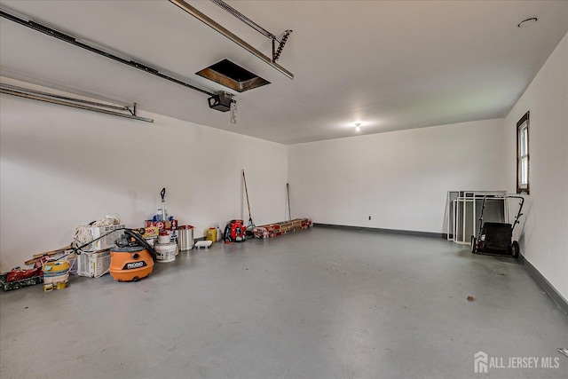 garage featuring a garage door opener