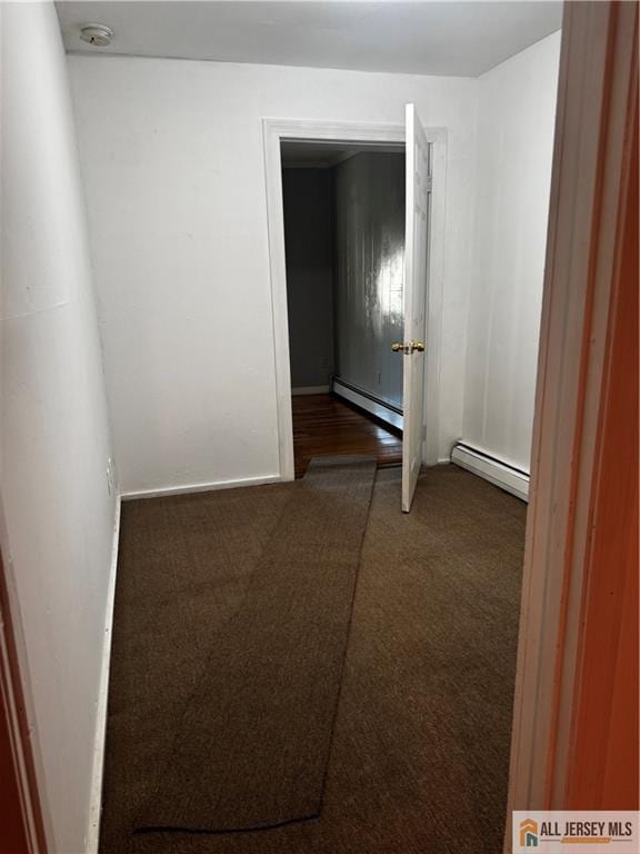280 Shoreland Cir S, Amboy, NJ 08879 - carpeted empty room featuring a baseboard radiator and a smoke detector