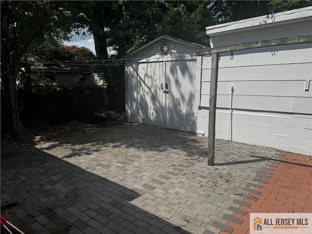 280 Shoreland Cir S, Amboy, NJ 08879 - garage featuring a shed