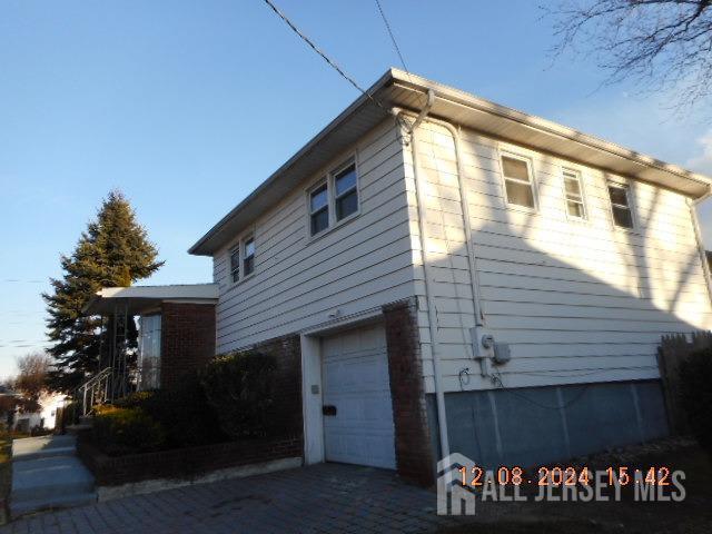 view of home's exterior featuring a garage