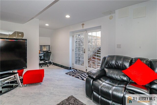 living area with recessed lighting