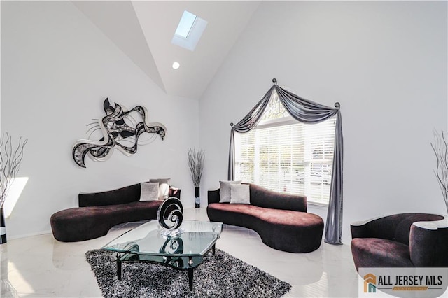 living area with marble finish floor, lofted ceiling with skylight, and recessed lighting