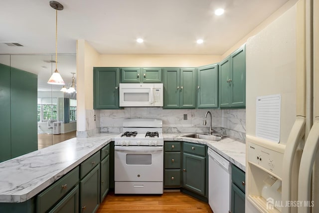 224 Pennsylvania Way N, Brunswick, NJ 08902 - kitchen featuring white appliances, green cabinets, a peninsula, decorative backsplash, and recessed lighting