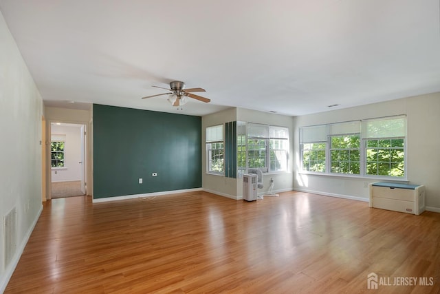 224 Pennsylvania Way N, Brunswick, NJ 08902 - unfurnished living room featuring ceiling fan and light wood-type flooring