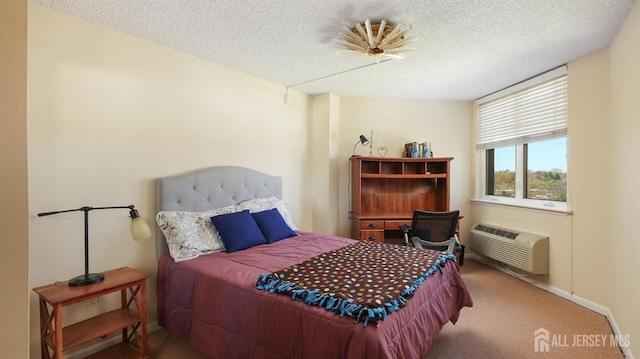 30 S Adelaide Ave Unit 7H, Highland Park, NJ 08904 - bedroom featuring a textured ceiling, carpet floors, and a wall unit AC