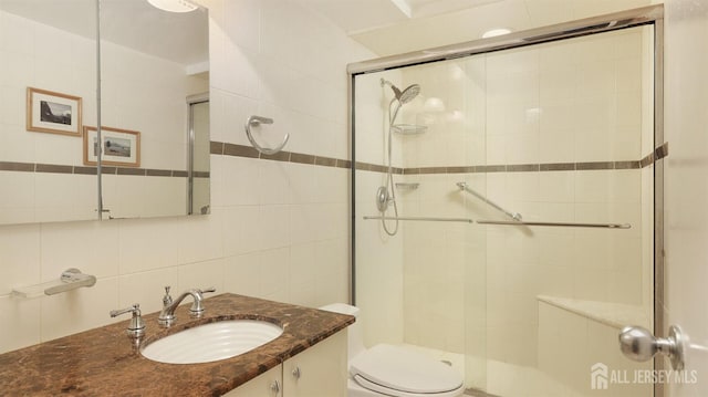 30 S Adelaide Ave Unit 7H, Highland Park, NJ 08904 - full bath featuring a shower stall, vanity, tile walls, and backsplash