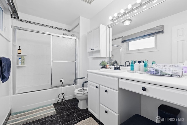 265 Plum Dr, Marlboro, NJ 07746 - bathroom featuring vanity and bath / shower combo with glass door